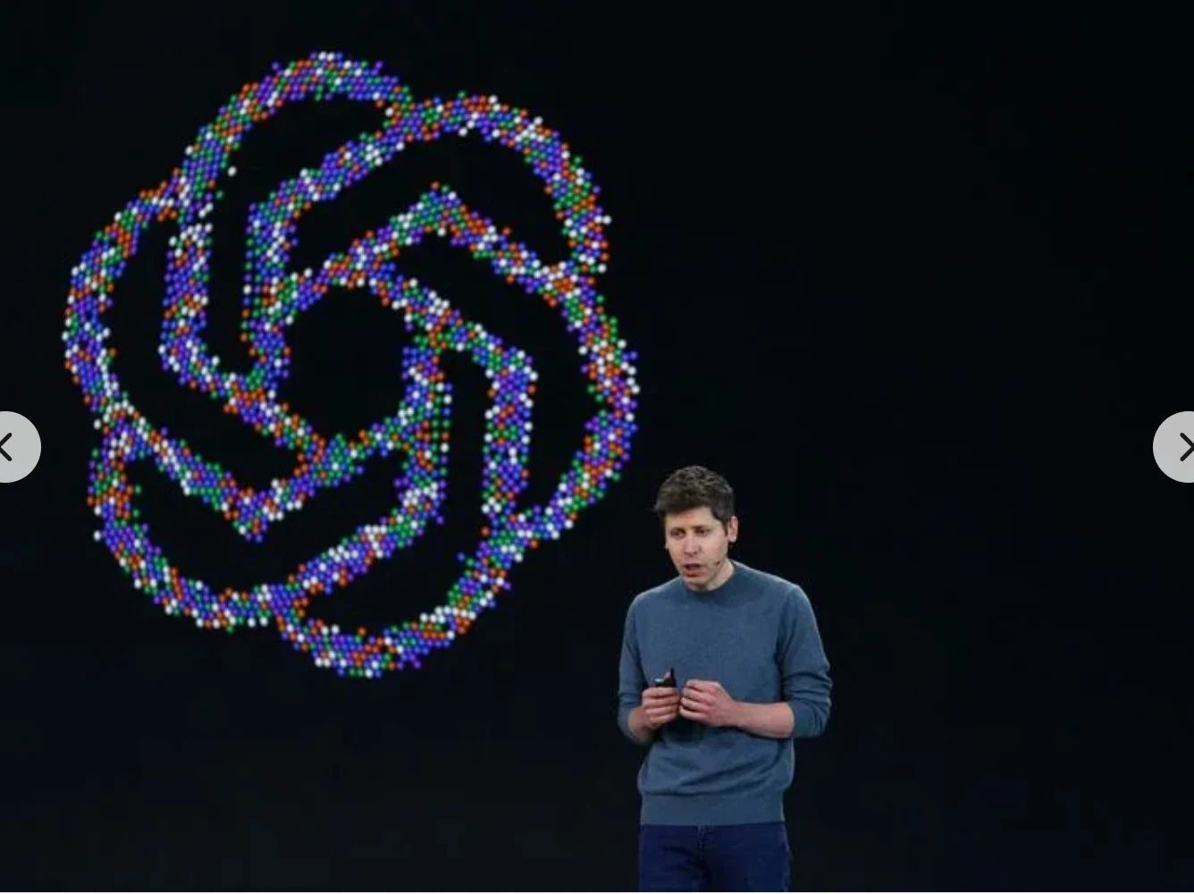 Sam Altman on stage at OpenAI DevDay 2026 in San Francisco, in front of a large OpenAI mark